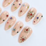 Festive Elegance: Medium Almond Press-On Nails with Colorful Gems and Gold Chrome Snow – Perfect for Christmas Nights and Gifts for Her - Image 2