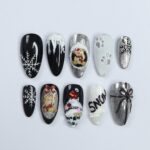 Elevate Your Holiday Style with Medium Almond Press-On Nails: Sleek Black Design Adorned with White Snowflakes - Perfect Christmas Gift