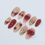 Elegant Cherry Press-On Nails - Red & Nude with 3D Bows, Gold Accents, Romantic Design - Medium Almond, Perfect Gift or Daily Nails - Image 5
