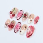 Press On Nails Golden Cupid with Cherry Charms | 3D Heart & Jewel Nails in Medium Almond | Handmade Romantic Nail Art for Holiday, Birthday - Image 3