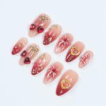 Press On Nails Cupid’s Kiss with Gold Heart | 3D Bow & Gem Fake Nail in Medium Almond | Handmade Nail Art for Holiday, Anniversary, Birthday - Image 2