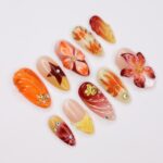 Press On Nails Autumn Blaze with Floral & Leaf Art | 3D Fake Nails in Medium Almond | Handmade Fall Nail Art for Holiday, Vacation, Birthday - Image 4