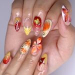 Press On Nails Autumn Blaze with Floral & Leaf Art | 3D Fake Nails in Medium Almond | Handmade Fall Nail Art for Holiday, Vacation, Birthday - Image 3