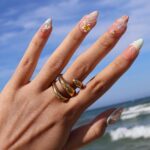 Summer Press On Nails Plumeria with Starfish | 3D Fake Nails in Medium Almond | Handmade Seashell Nail Art for Holiday, Vacation, Birthday - Image 2
