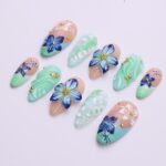 Press on Nails Mint Green with Blue Tropical Flowers | 3D Fake Nails in Medium Almond | Handmade Nail Art for Holiday, Vacation, Birthday - Image 5