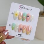 Summer Press on Nails with Pastel Flowers | French Tip Fake Nails in Medium Almond | Handmade Nail Art for Vacation, Beach & Everyday Wear - Image 6