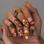 Fall Press On Nails with Tropical Flowers & Leaves | 3D Floral Fake Nails in Medium Almond | Handmade Nail Art for Fall Looks Or Parties - Image 5