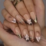 Autumn Press On Nails with Tortoiseshell, Gold Tips & Floral | Nude Fake Nails in Medium Almond | Handmade Nail Art for Everyday Looks - Image 4