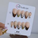 Autumn Press On Nails with Tortoiseshell, Gold Tips & Floral | Nude Fake Nails in Medium Almond | Handmade Nail Art for Everyday Looks - Image 5