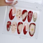 Christmas Press On Nails with Red & Gold Design | Fake Nails in Medium Almond | Handmade Nail Art For Holiday, Birthday Or Gift For Her - Image 3