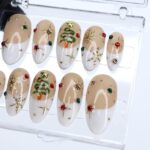 Christmas Press On Nails with White French Tips & Christmas Tree Design | Nude Medium Almond Fake Nails | Handmade Holiday Nail Art - Image 4