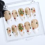 Christmas Press On Nails with White French Tips & Christmas Tree Design | Nude Medium Almond Fake Nails | Handmade Holiday Nail Art - Image 3
