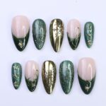 Christmas Press-On Nails in Green & Gold with Snowflake, Star and Moon Designs | Medium Almond Fake Nails | Handmade Holiday Nail Art