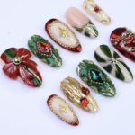 Christmas Press-On Nails with Red Bow, Emerald Gem & Gold Star Designs | Medium Almond Fake Nails | Handmade Luxury Holiday Nail Art - Image 5