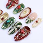 Christmas Press-On Nails with Red Bow, Emerald Gem & Gold Star Designs | Medium Almond Fake Nails | Handmade Luxury Holiday Nail Art - Image 2