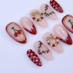 Christmas Press On Nails with Cherries, Snowflakes & Wreath Charms | Fake Nails in Medium Almond | Handmade Holiday Nail Art Gift Set - Image 2