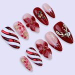Christmas Press On Nails | Red Candy Cane, Poinsettia & Reindeer Design | Medium Almond | Handmade Holiday Nail Art - Image 2
