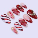 Christmas Press On Nails | Red Candy Cane, Poinsettia & Reindeer Design | Medium Almond | Handmade Holiday Nail Art - Image 4