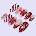 Christmas Press On Nails | Red Candy Cane, Poinsettia & Reindeer Design | Medium Almond | Handmade Holiday Nail Art - Image 3