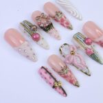 Christmas Press On Nails with Pink Wreath, Bow & Pearl Accents | Long Almond Fake Nails | Handmade Holiday Nail Art for Gifts or Parties - Image 2