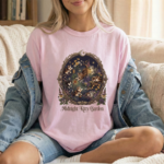 Midnight Kitty Garden Shirt, Vintage Style Cat Lover T-Shirt, Cottagecore Aesthetic Flower Garden Tee, Whimsical Retro Cat Mom Gift, Comfort Colors® 1717 Unisex Graphic Tee, Dark Academia Feline Shirt