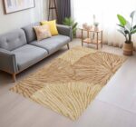 A washable area rug with a warm beige and caramel-toned leaf pattern. A textured botanical carpet perfect for decorating your living room or bedroom. - Image 4